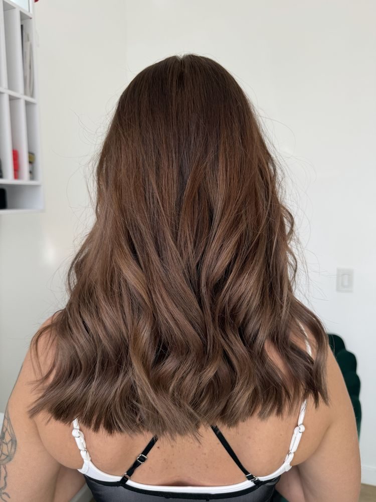 Balayage with soft waves on brown hair